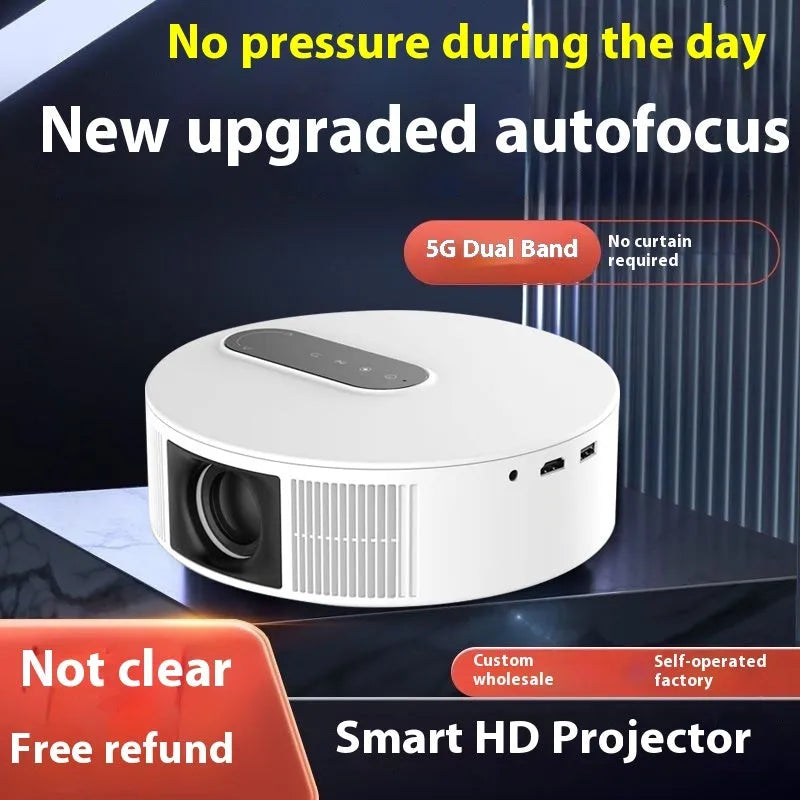 White HD 720p home theatre projector with remote control on a table
