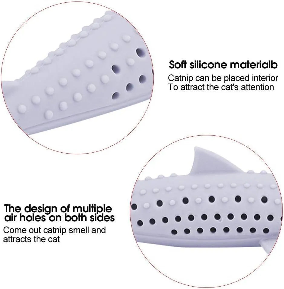 Green silicone fish-shaped cat chew toy with removable design showing breathable side holes