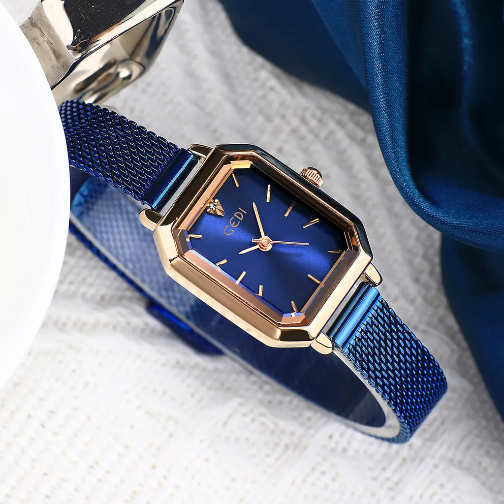 Square rose gold casual watch with black dial and black leather strap showing 8mm thickness