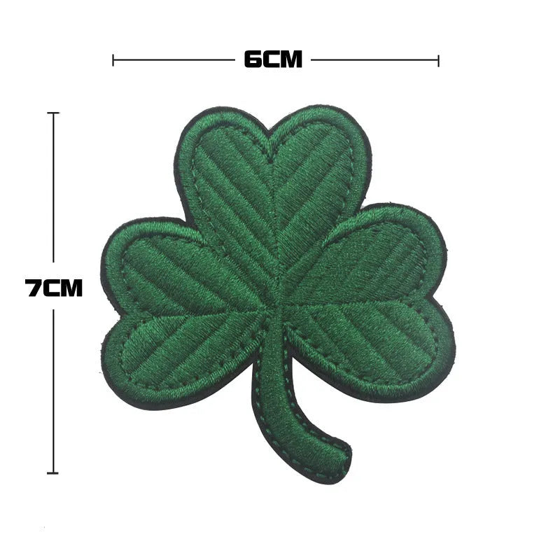 Embroidered fabric badge with Velcro strip in various colour options including green and black patterns