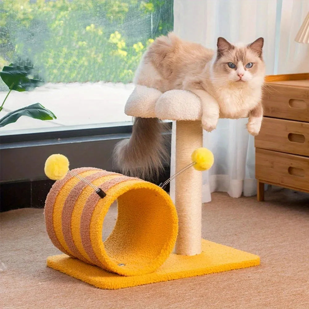 Yellow cat tree with sisal scratching posts and a fabric tunnel.