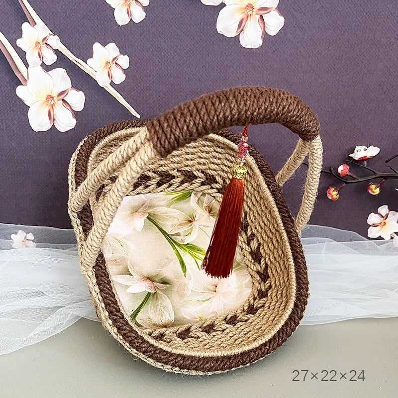 Hand-woven straw basket with hemp rope finish in coffee brown colour