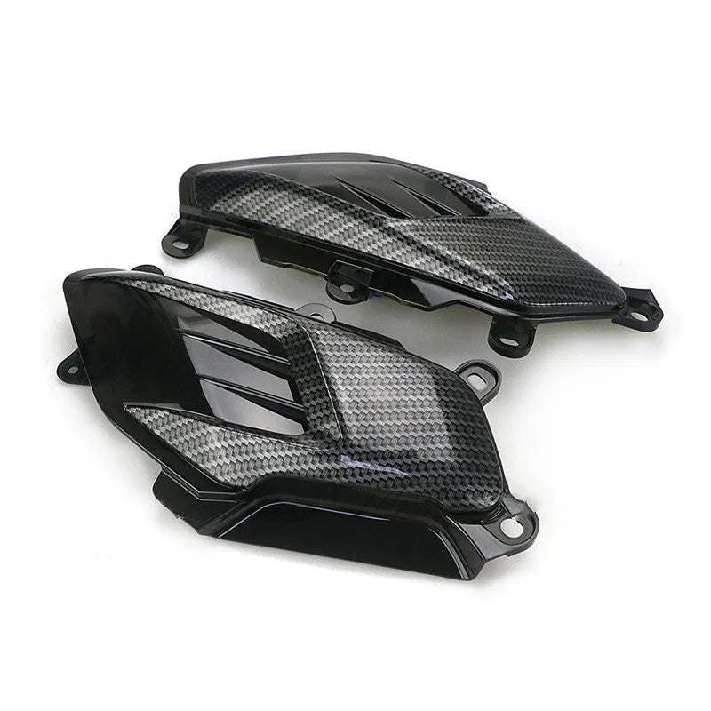 Pair of YAMAHA NMAX scooter side lamps with carbon fibre decoration and blue/red light option.