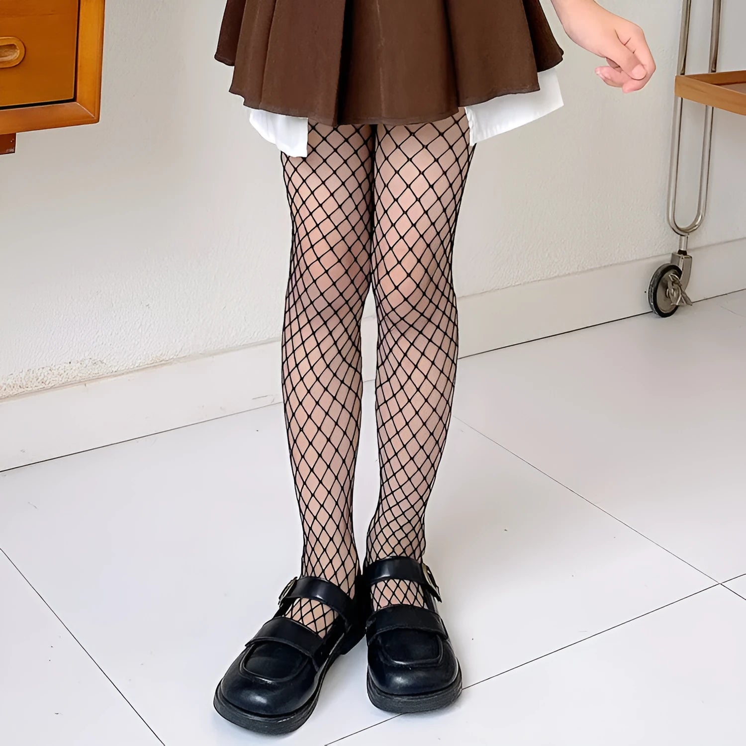Women's black and white mesh stockings showing large, medium, and small pattern options.