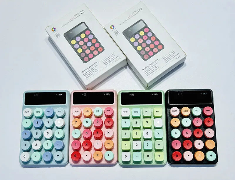 Q3 wireless digital keyboard in a macaron colour option on a desk.