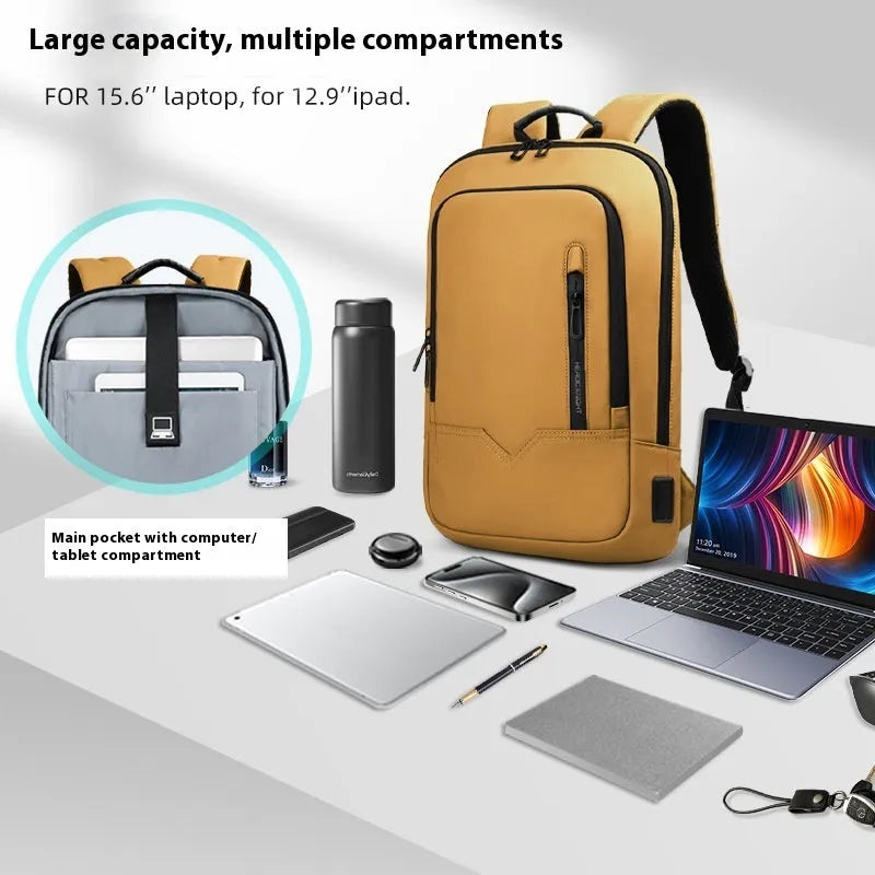 Lightweight grey polyester computer backpack with USB charging port on the shoulder strap