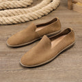 Handmade grey low-top men's shoes with a wedge rubber sole