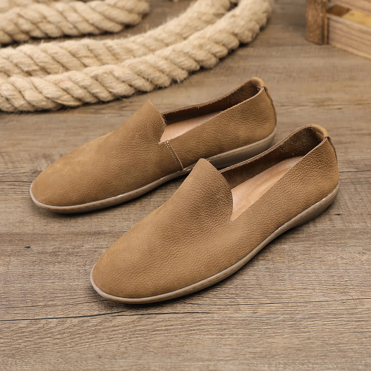 Handmade grey low-top men's shoes with a wedge rubber sole