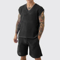 Men's blue V-neck sleeveless vest and matching shorts sports suit on hanger