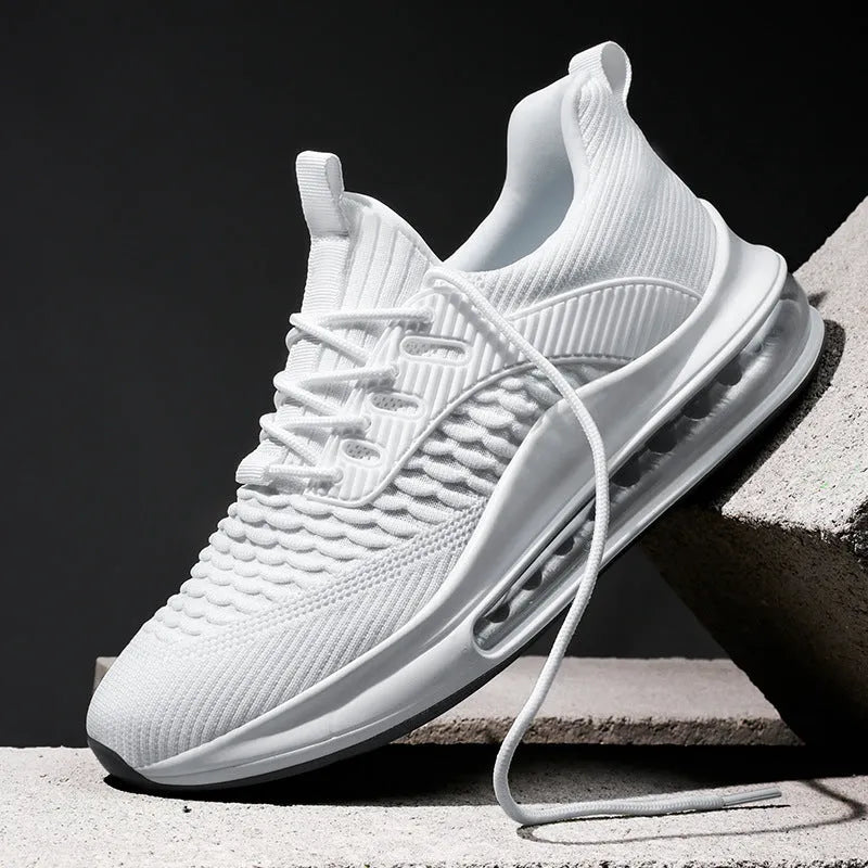 Men's black low-top lace-up running sneakers with mesh upper on a white background.
