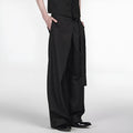 Black straight-leg women's trousers with a pleated front and adjustable waistband on a neutral background.