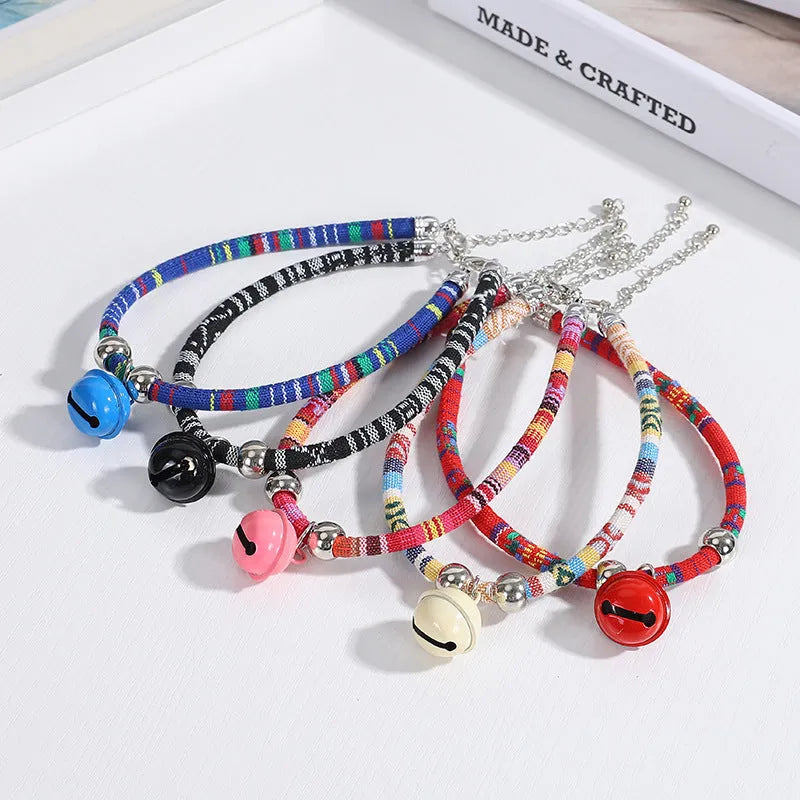 Adjustable ethnic pattern pet collar with metal bell for a cat or small dog