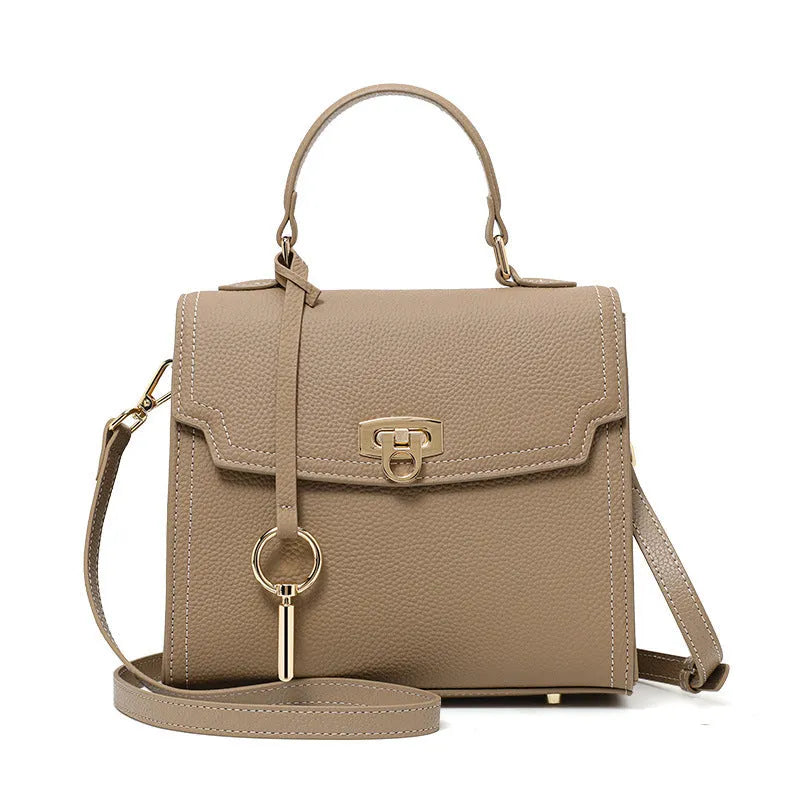 Elephant grey genuine leather handbag with litchi pattern texture and vintage lock hardware