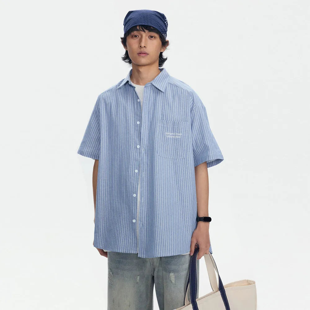 Blue and white striped short-sleeved cardigan-style shirt on a hanger