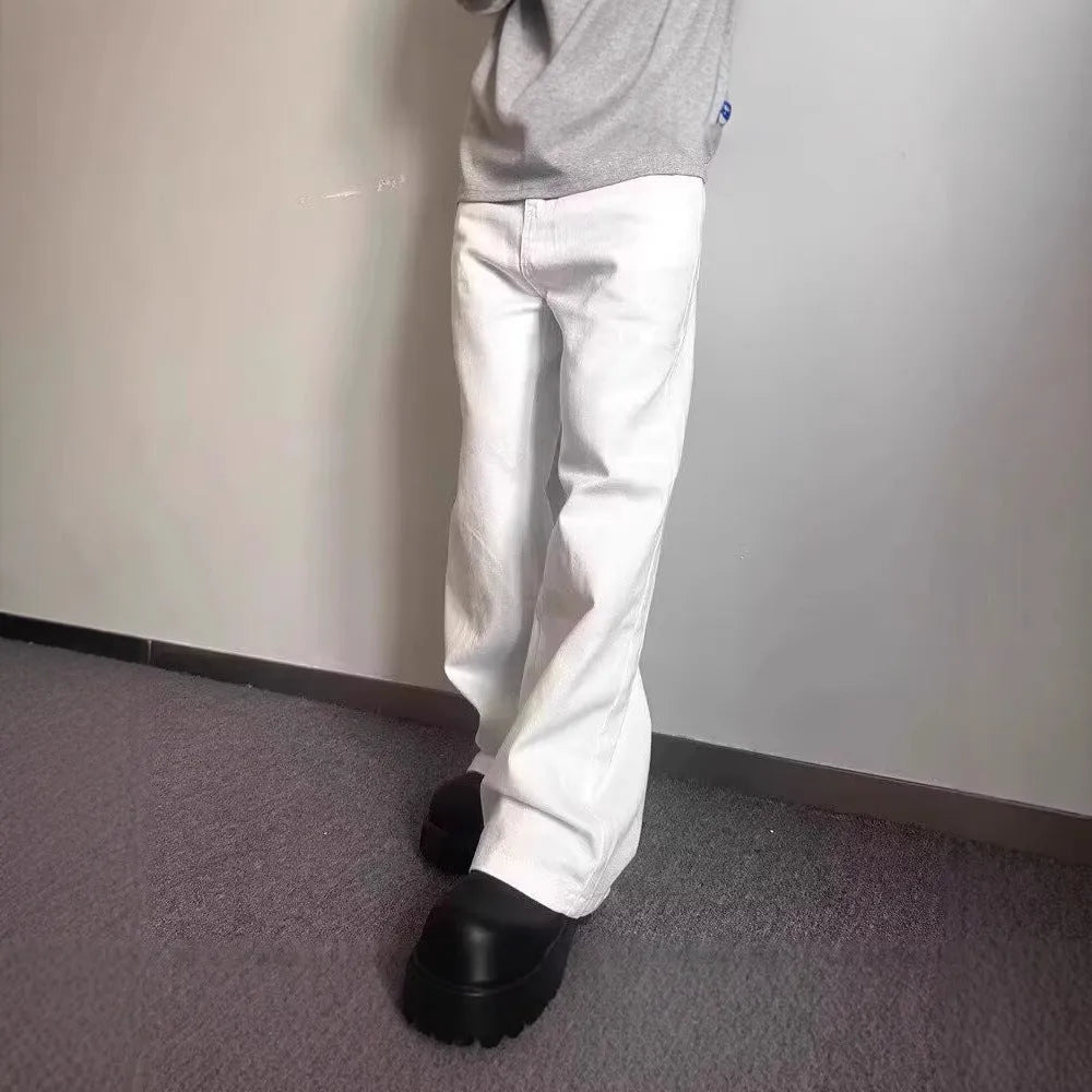 Men's straight-cut white wide-leg denim jeans with a mid waist and zipper fly