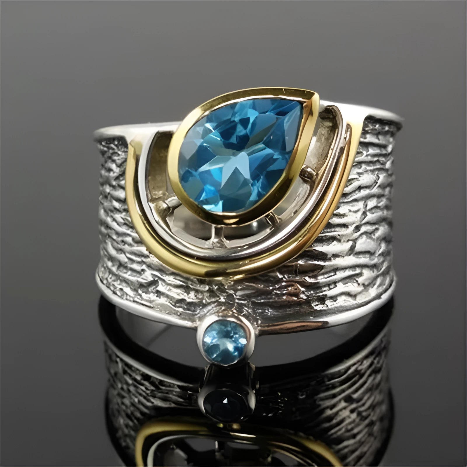 Blue Chinese style zircon ring with drop shape design and inlaid rhinestone detailing on alloy band