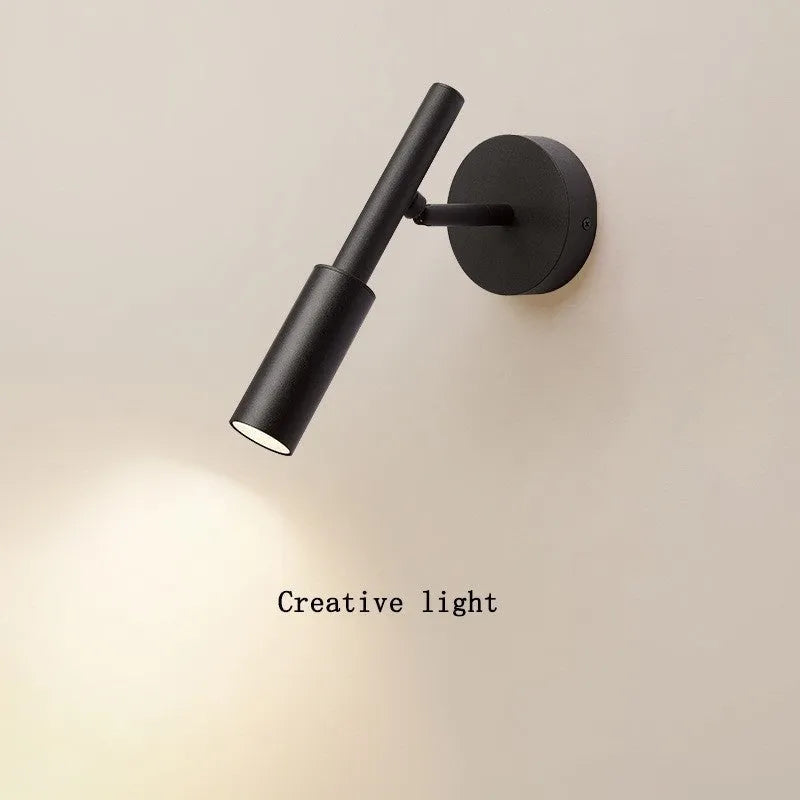 Modern wrought iron wall lamp with three colour lighting in black or white finish