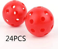 Multi-colour golf practice balls showing red, orange, blue, green, white and yellow variants with 26-hole design