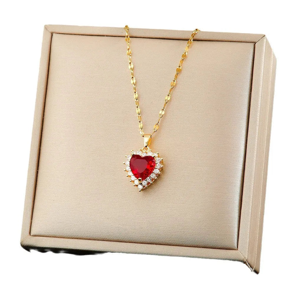 Gold red heart flower pendant necklace with matching earrings and ring set, made from titanium steel.