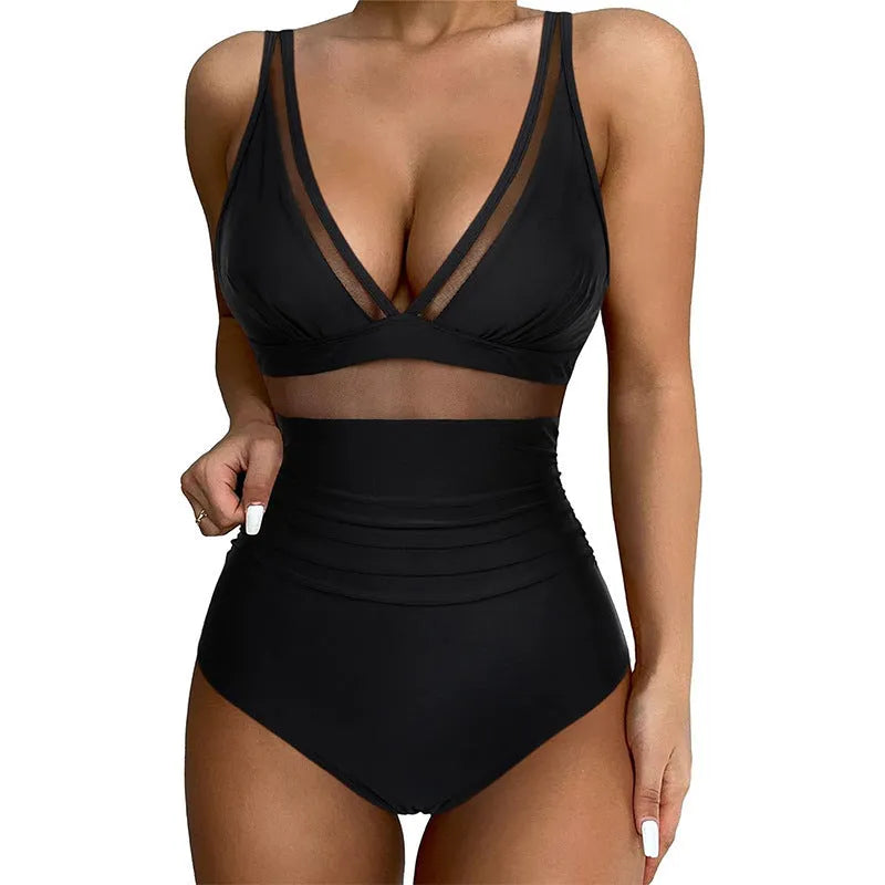 Black women's halter neck one-piece swimsuit with mesh panels on mannequin