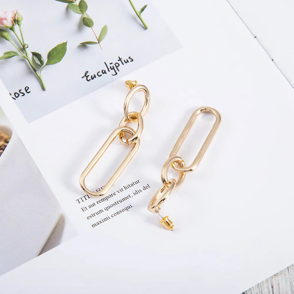 Geometric sterling silver needle colour hoop earrings with ring and line design elements