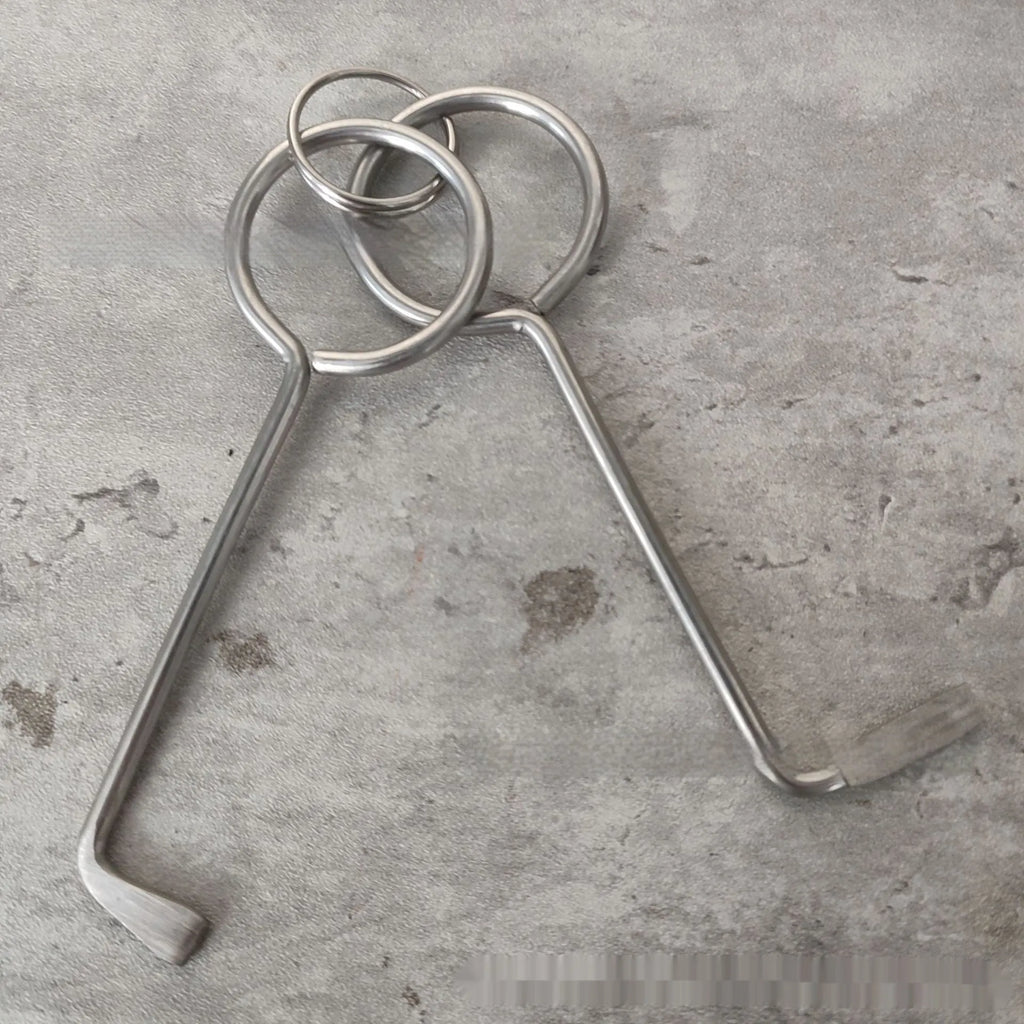 Two alloy wrench tools from a portable manual tool set for household repairs