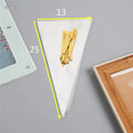 Clear triangle-shaped plastic packaging bag with a twisted wire tie closure on a white background.