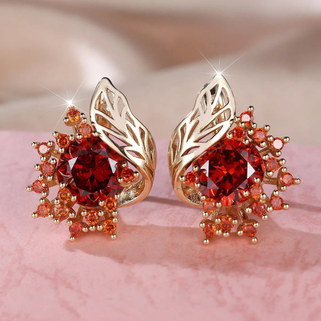 Round flower feather design earrings with champagne gold setting and coloured zircon stones.