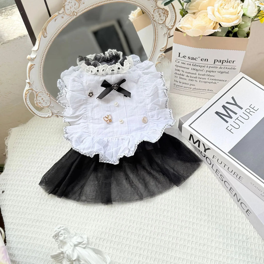 White polyester princess-style waltz gauze skirt for a small dog on a hanger.