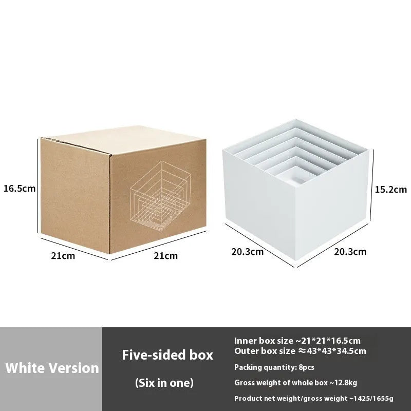 Set of six white plastic cube-shaped dessert display stands arranged on a desktop.
