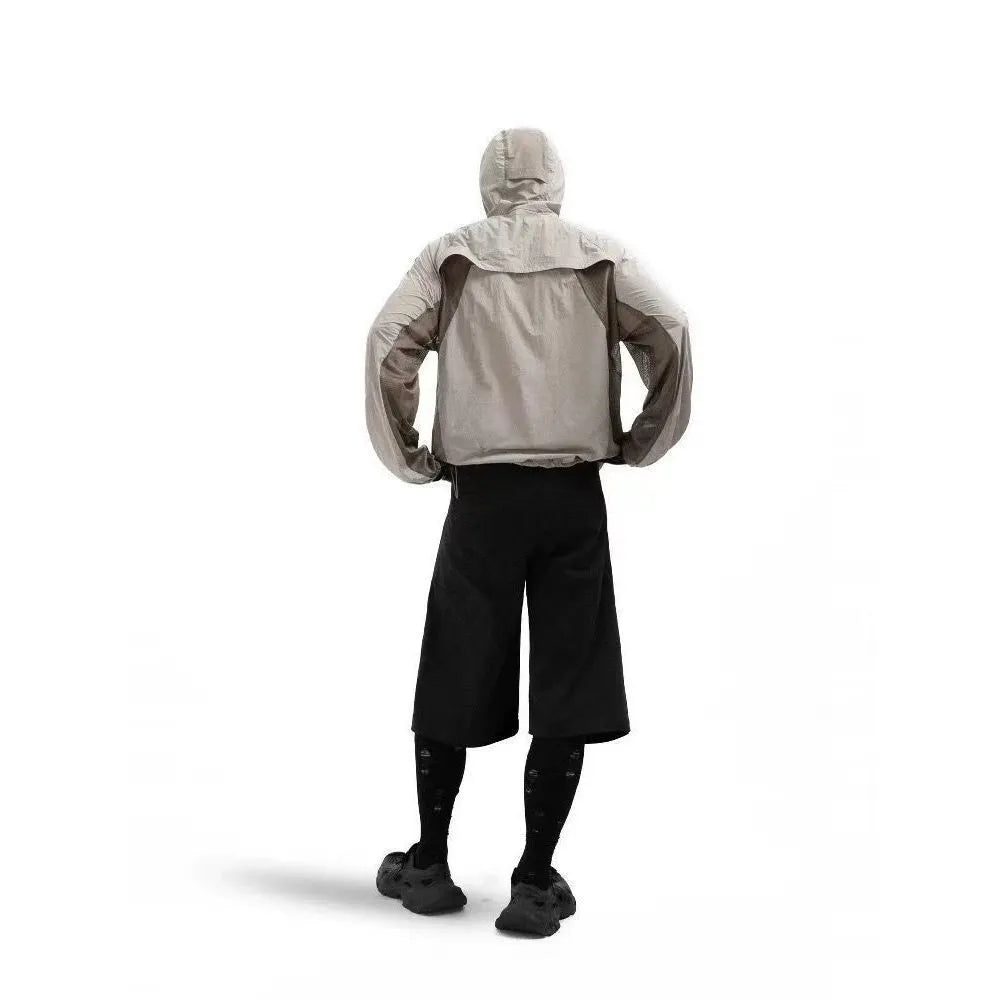 Sun protective clothing with mesh stitching in desert brown colour showing regular length design