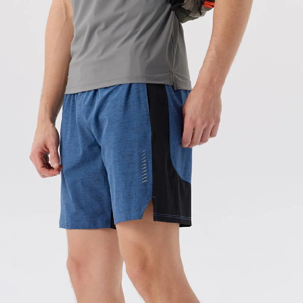 Men's forest green five-point spandex casual shorts on a mid-waist fit model.