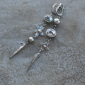 Geometric long pendant earrings with XINGX design and rhinestones in antique silver