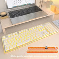 Wireless mute Bluetooth keyboard in cherry blossom pink with ice blue backlighting