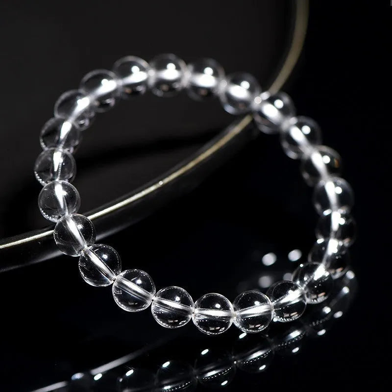 Natural Donghai Old Materials white crystal bracelet with round beads in geometric style.
