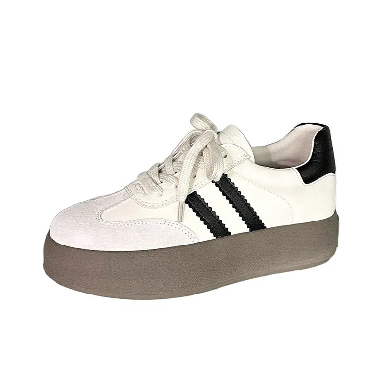 Women's vintage distressed leather sneakers with round toe and lace-up front