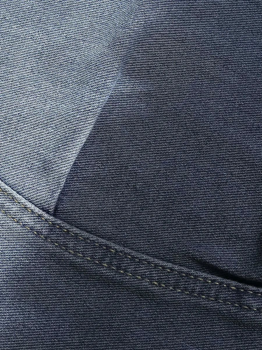 Blue tie-dye gradient cropped jeans with a washed-out, worn-in look and loose casual fit