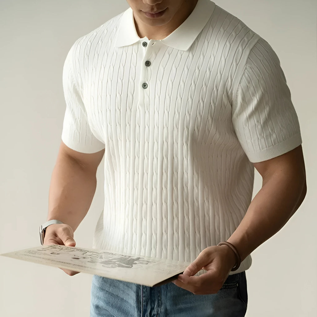 A man's khaki short-sleeve business commute top laid flat, showing its collar and sleeve detail.