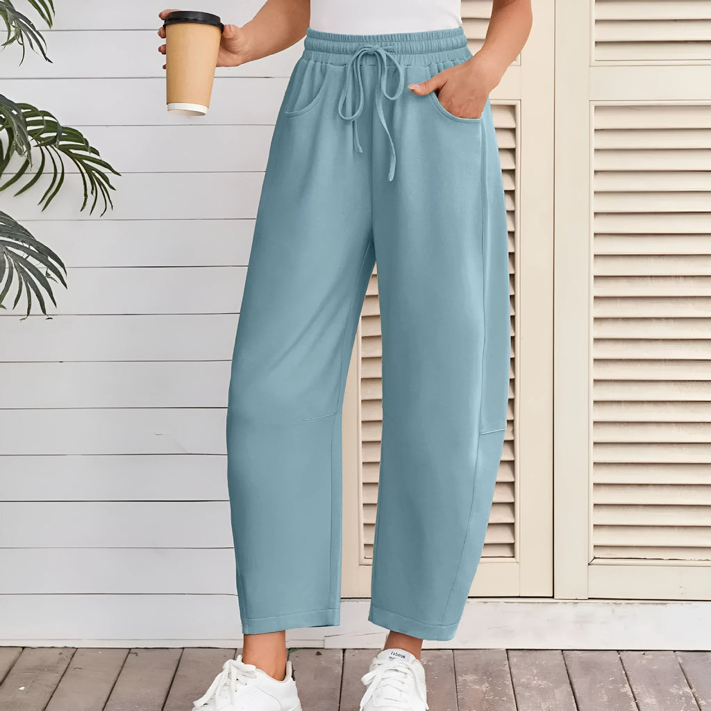 Women's loose fit cropped sweatpants with drawstring waist and side pockets in cotton blend fabric