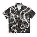 Short sleeve Cuban collar shirt with snake bone and floral pattern print in loose fit design