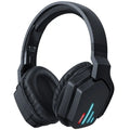 Luminous black wireless gaming headphones with head-mounted design on a desk with included 3.5mm cable and dust bag.