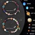 Set of two natural stone beaded bracelets with zodiac charms on an adjustable cord.