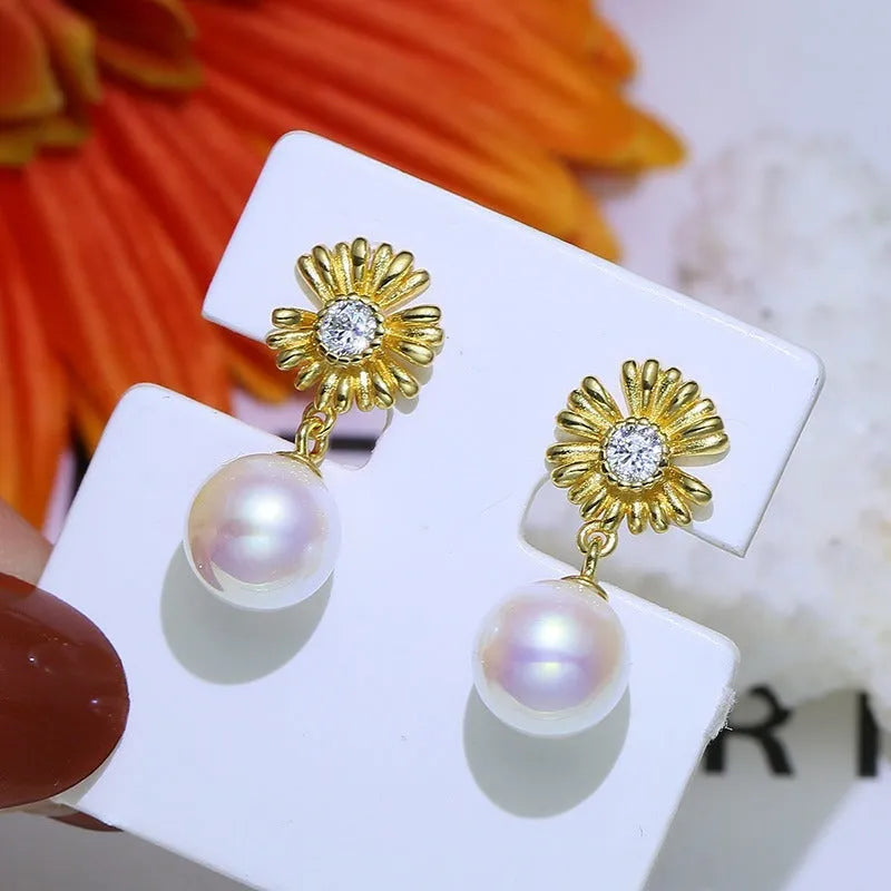 Baroque flower-shaped S925 sterling silver earring holder ring with a pair of drop earrings.