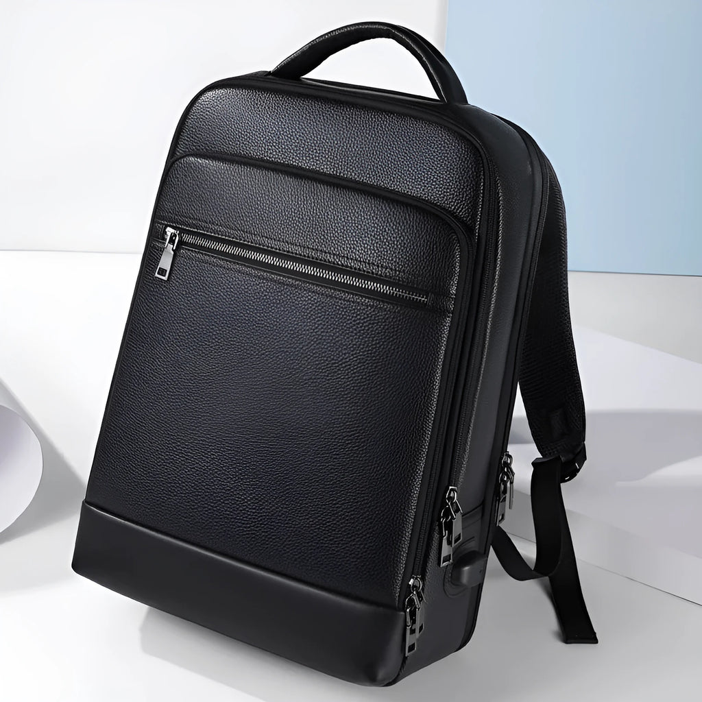 Black genuine leather men's business computer backpack with curved shoulder strap and sewing line detailing