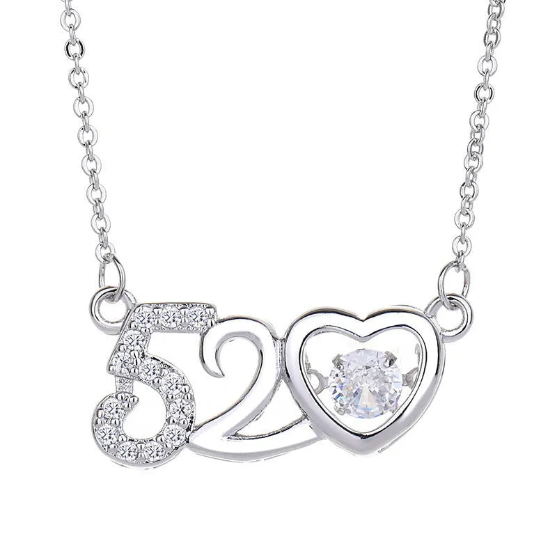 Silver heart-shaped necklace with crown and bow pendant on 45cm chain
