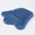 Blue silicone bath massage cushion mat with textured surface for handheld scrubbing.