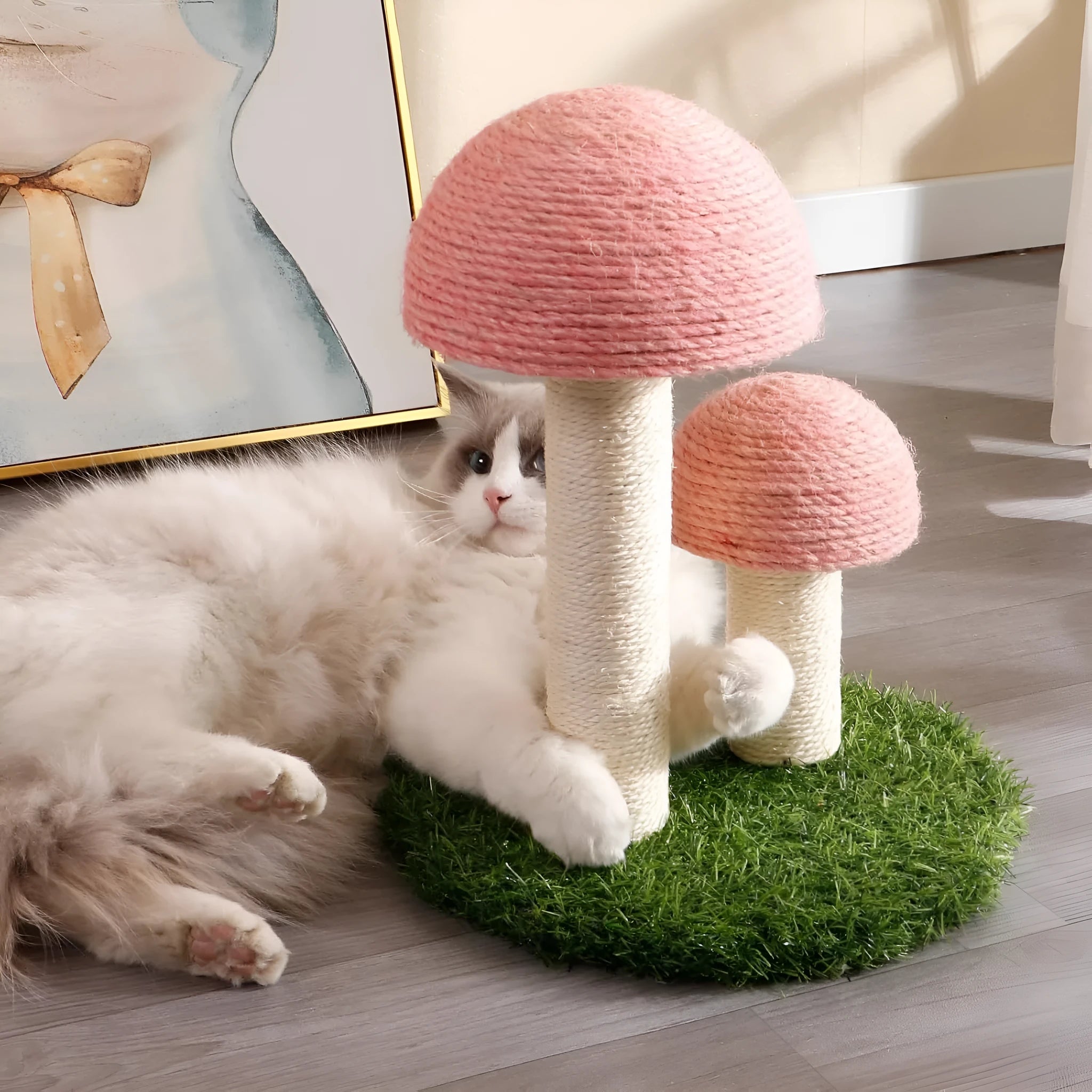 Pink mushroom-shaped cat scratching post with natural sisal scratching surfaces