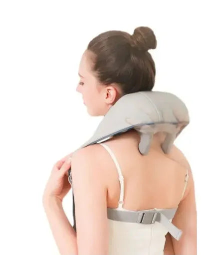 Creamy white rechargeable shoulder and neck massage instrument with USB cable.