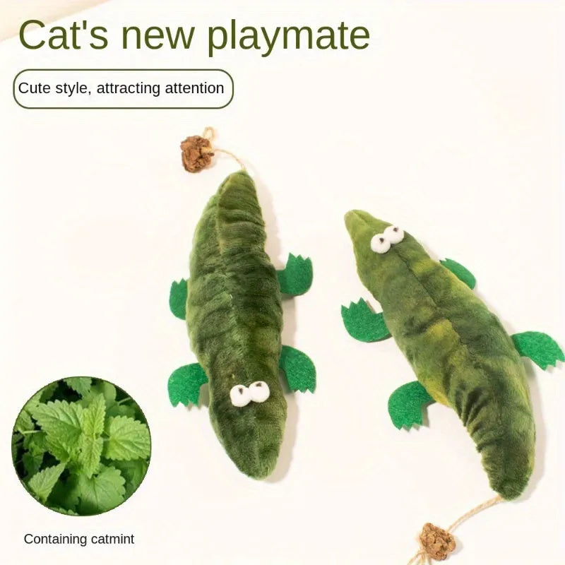 Green plush alligator cat toy with catnip filling and peppermint scent for oral cleansing.