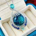 Women's geometric blue crystal pendant necklace with water wave chain